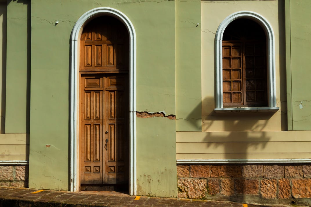 Wooden Window and Door with Green Facade