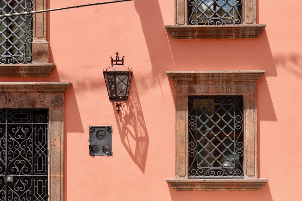 Mexican Colonial Style Windows And Peach Wall