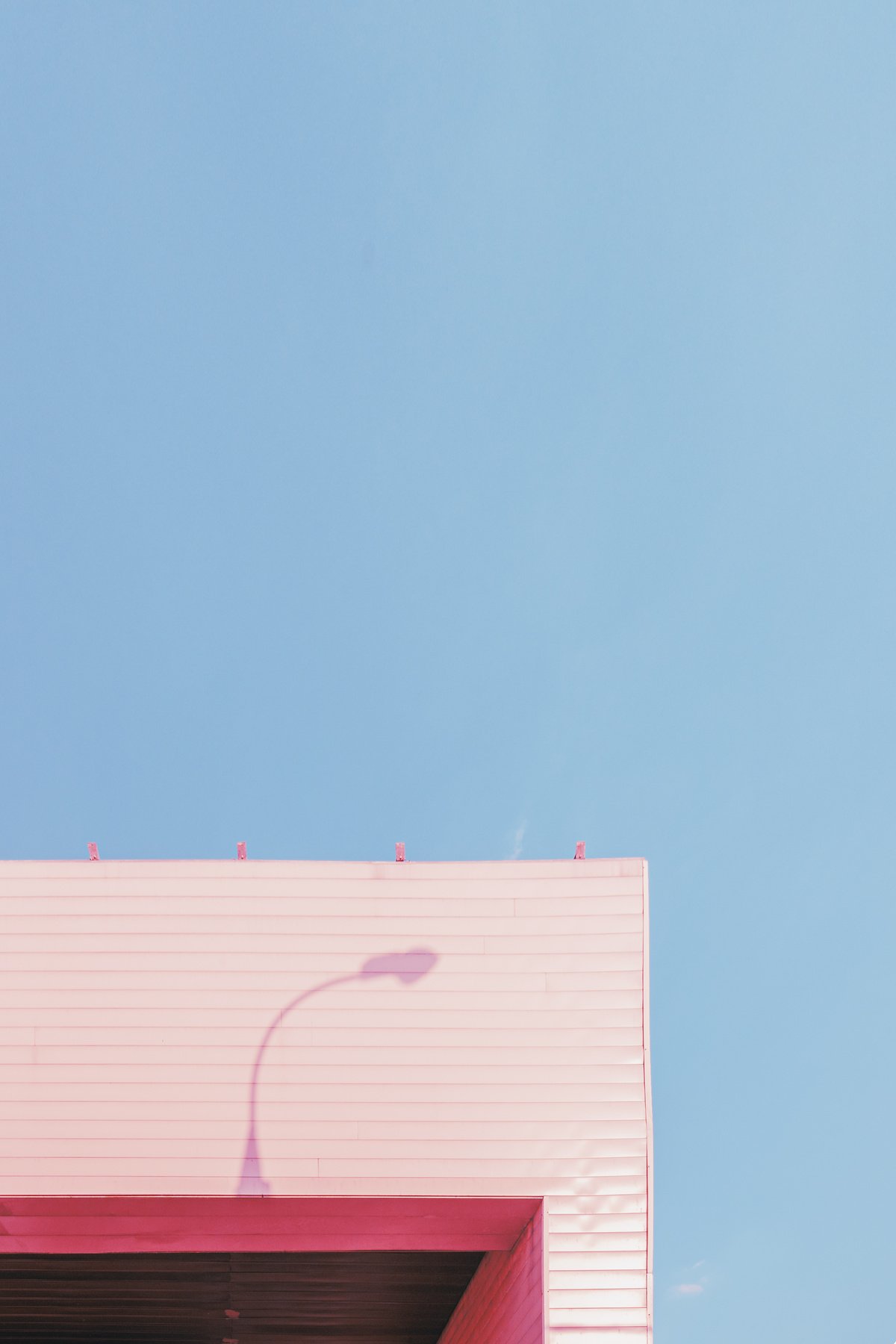 Pink Concrete Building on Clear Sky